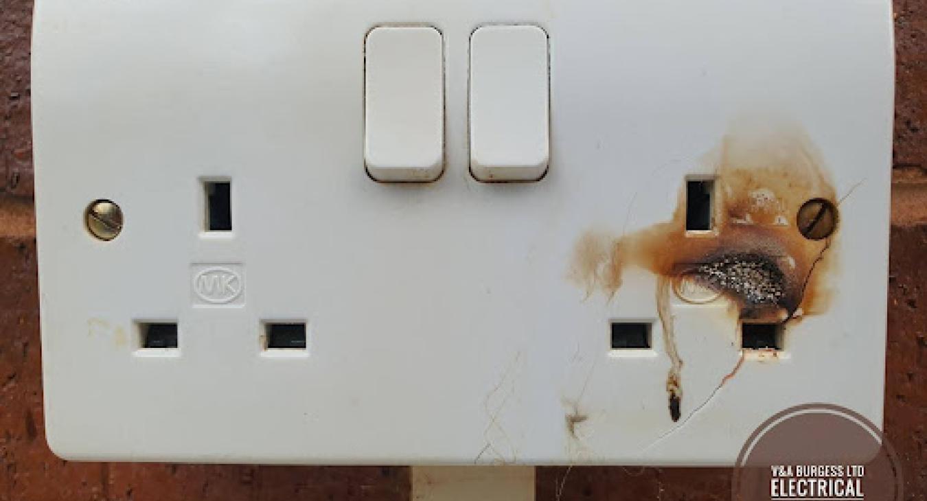Burnt socket - when to call an electrician