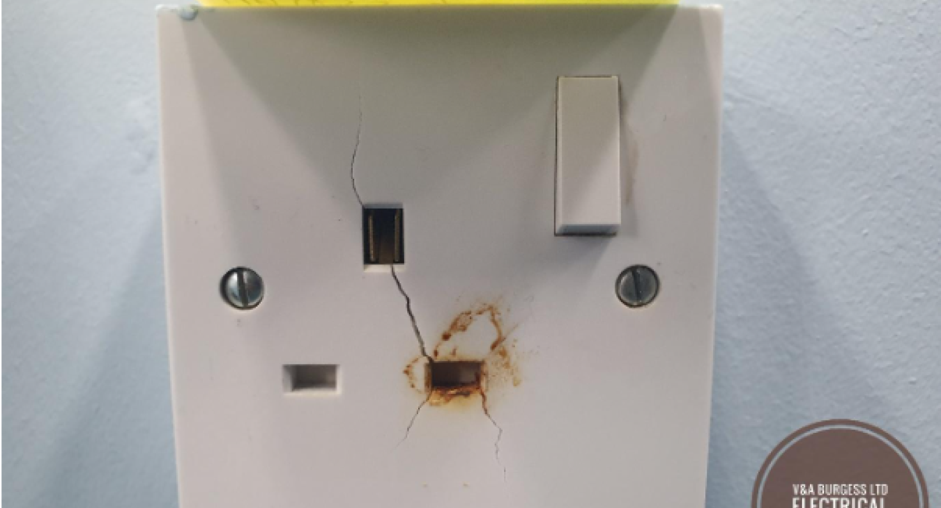 Electrical outlet sparking when plugging something in